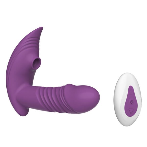 Marilyn sucks and retracts wearing vibrator